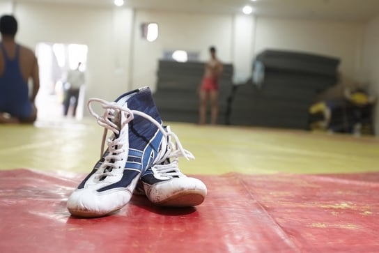 Wrestling boots at the gym